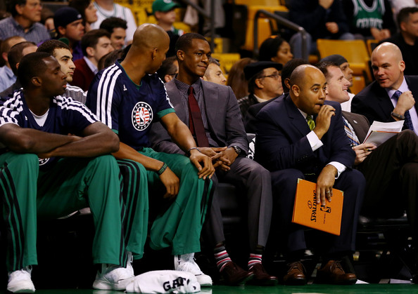 rondo on the bench in a suit