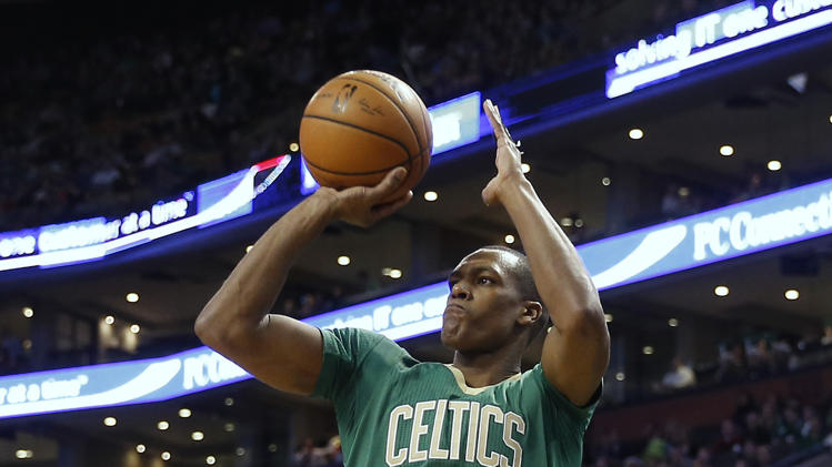 rondo shooting in sleeved jersey