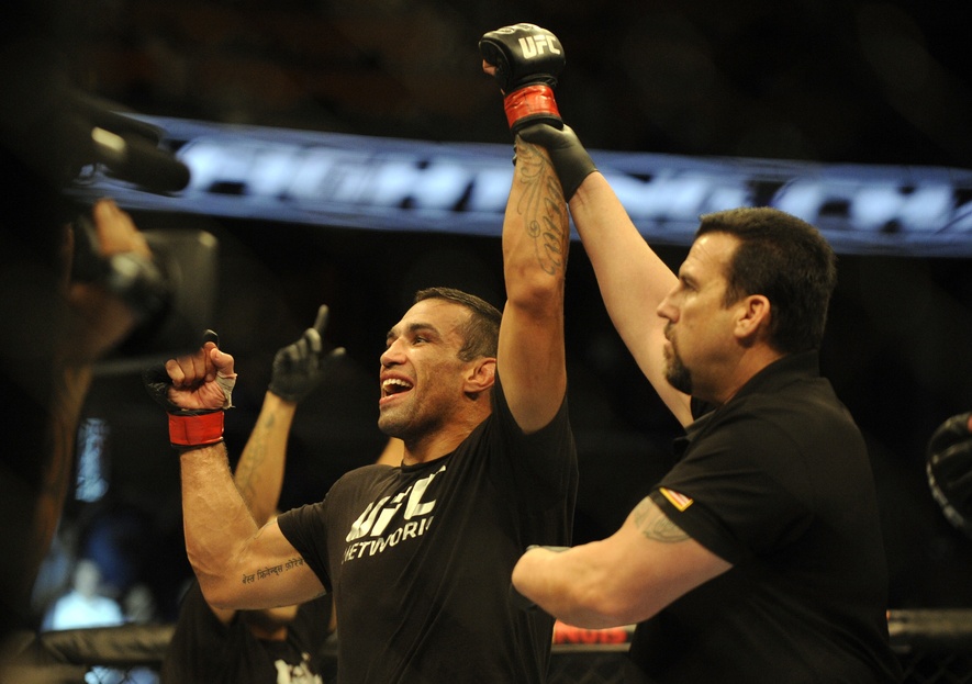fabricio werdum celebrates his win over travis browne with big john mccarthy