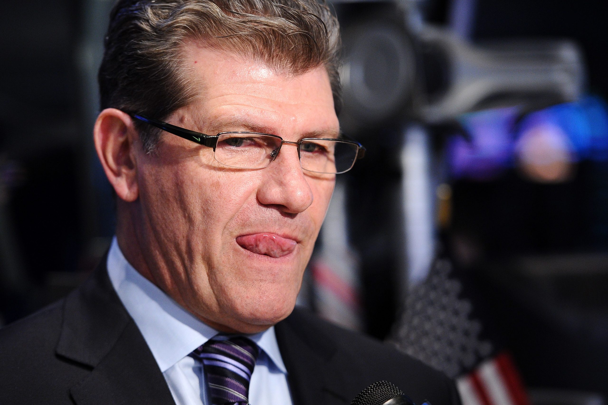 Connecticut Huskies Coaches Geno Auriemma And Kevin
      Ollie Ring The NYSE Closing Bell