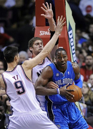 Dwight Howard, Yi Jianlian, Brook Lopez