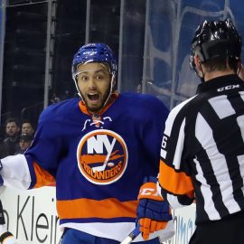 NEW YORK, NY - MARCH 25: Joshua Ho-Sang #66 of the New York Islanders argues a high sticking penalty against the Boston Bruins with referee Francis Charron #6 at the Barclays Center on March 25, 2017 in the Brooklyn borough of New York City. (Photo by Bruce Bennett/Getty Images)