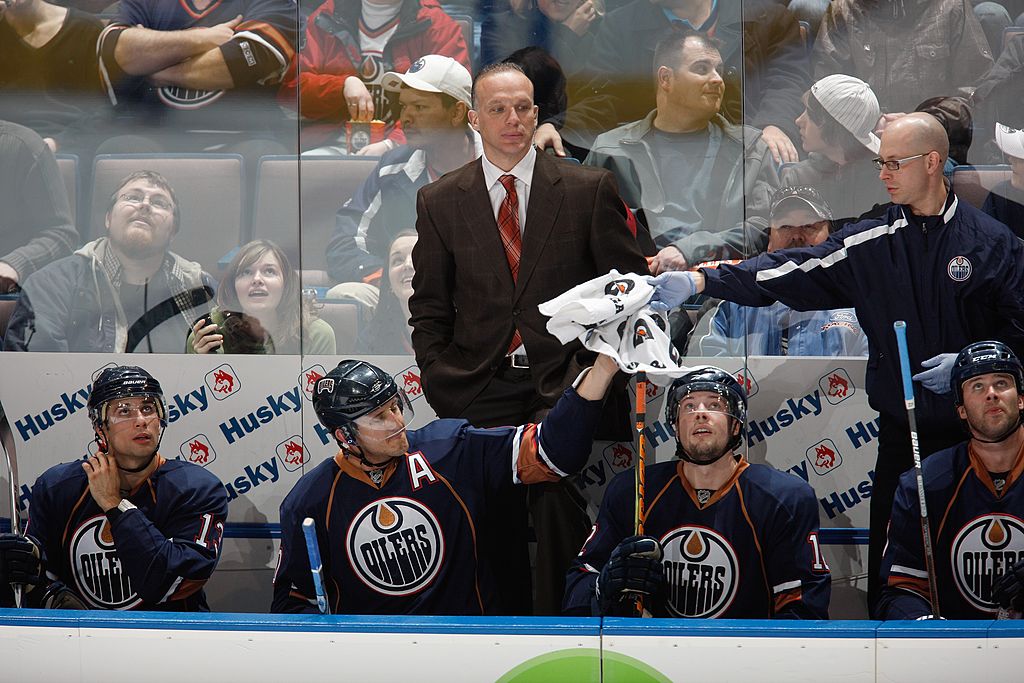EDMONTON, CANADA - MARCH 5: Assistant coach Kelly Buchberger, Shawn Horcoff #10, Robert Nilsson #12 and Andrew Cogliano #12 of the Edmonton Oilers rest on the bench against the Minnesota Wild on March 5, 2010 at Rexall Place in Edmonton, Alberta, Canada. (Photo by Dale MacMillan/Getty Images)