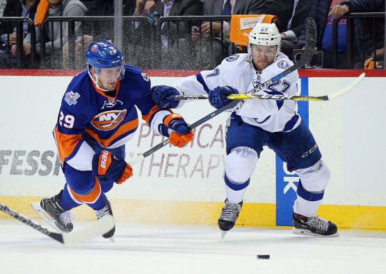 NEW YORK, NY - MAY 03: Brock Nelson #29 of the New York Islanders and Jonathan Drouin #27 of the Tampa Bay Lightning battle for the puck during the first period in Game Three of the Eastern Conference Second Round during the 2016 NHL Stanley Cup Playoffs at the Barclays Center on May 03, 2016 in the Brooklyn borough of New York City. (Photo by Bruce Bennett/Getty Images)