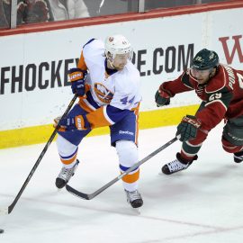 ST PAUL, MN - DECEMBER 29: Calvin de Haan #44 of the New York Islanders controls the puck against Jason Pominville #29 of the Minnesota Wild during the third period of the game on December 29, 2013 at Xcel Energy Center in St Paul, Minnesota. The Islanders defeated 5-4. (Photo by Hannah Foslien/Getty Images)