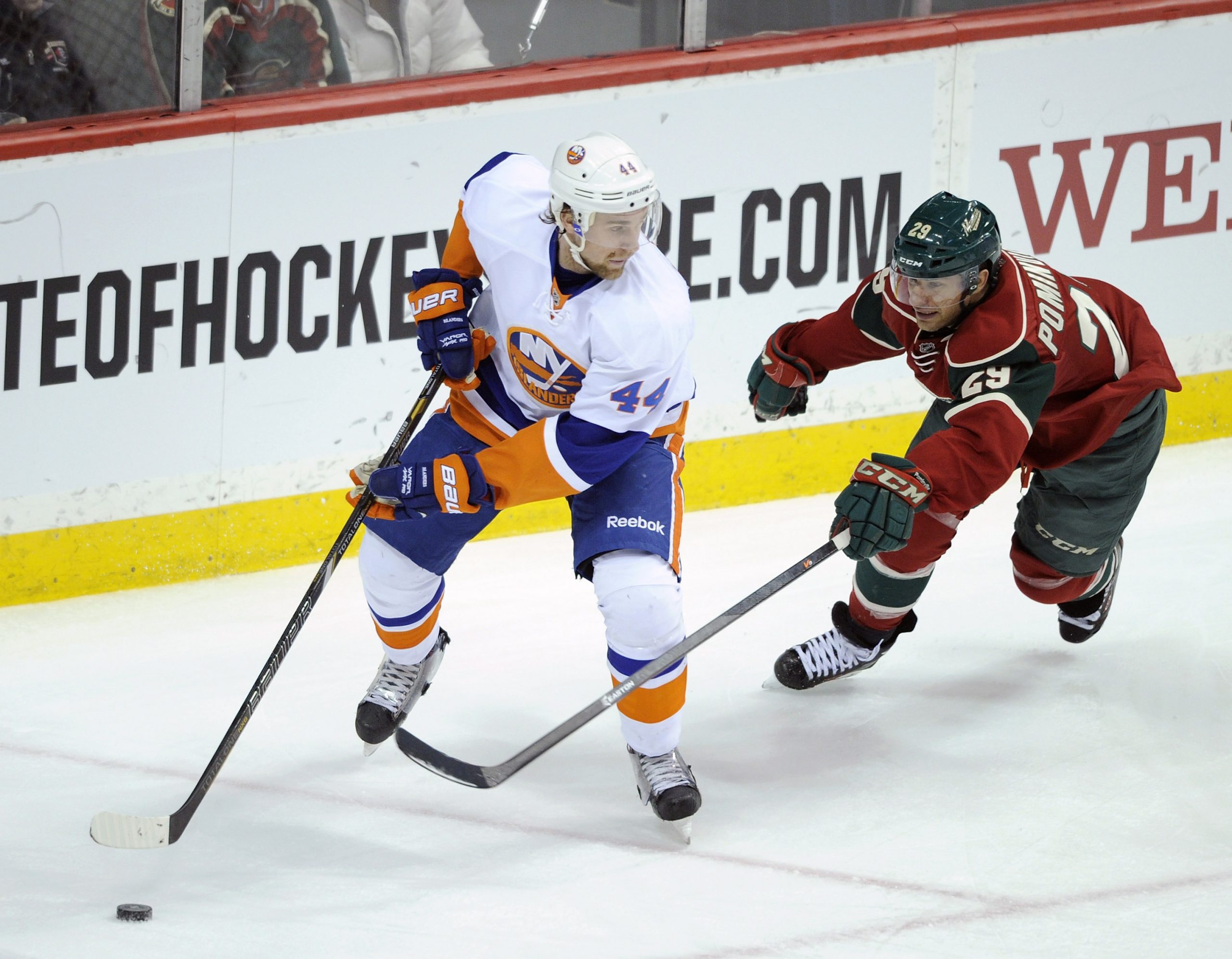 ST PAUL, MN - DECEMBER 29: Calvin de Haan #44 of the New York Islanders controls the puck against Jason Pominville #29 of the Minnesota Wild during the third period of the game on December 29, 2013 at Xcel Energy Center in St Paul, Minnesota. The Islanders defeated 5-4. (Photo by Hannah Foslien/Getty Images)