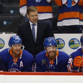 NEW YORK, NY - SEPTEMBER 25: Head coach Doug Weight of the New York Islanders handles bench duties against the New Jersey Devils during a preseason game at the Barclays Center on September 25, 2017 in the Brooklyn borough of New York City. The Islanders shut out the Devils 3-0. (Photo by Bruce Bennett/Getty Images)