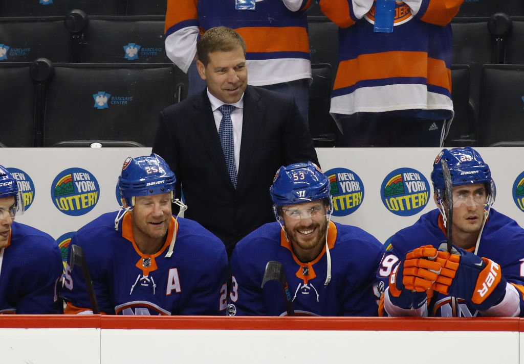NEW YORK, NY - SEPTEMBER 25: Head coach Doug Weight of the New York Islanders handles bench duties against the New Jersey Devils during a preseason game at the Barclays Center on September 25, 2017 in the Brooklyn borough of New York City. The Islanders shut out the Devils 3-0. (Photo by Bruce Bennett/Getty Images)