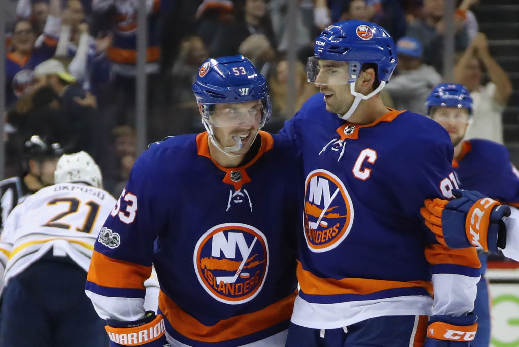 NEW YORK, NY - OCTOBER 07: (l-r) Casey Cizikas #53 and John Tavares #91 of the New York Islanders celebrate Cizikas's empty net goal against the Buffalo Sabres at the Barclays Center on October 7, 2017 in the Brooklyn borough of New York City. The Islanders defeated the Sabres 6-3. (Photo by Bruce Bennett/Getty Images)