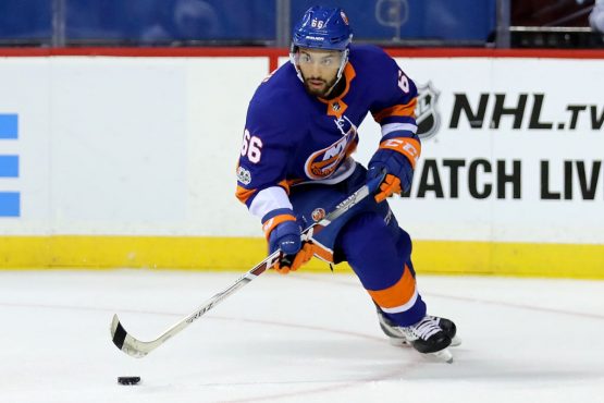 NEW YORK, NY - OCTOBER 07: Joshua Ho-Sang #66 of the New York Islanders passes the puck against the Buffalo Sabres in the first period at Barclays Center on October 7, 2017 in the Brooklyn Borough of New York City. (Photo by Abbie Parr/Getty Images)