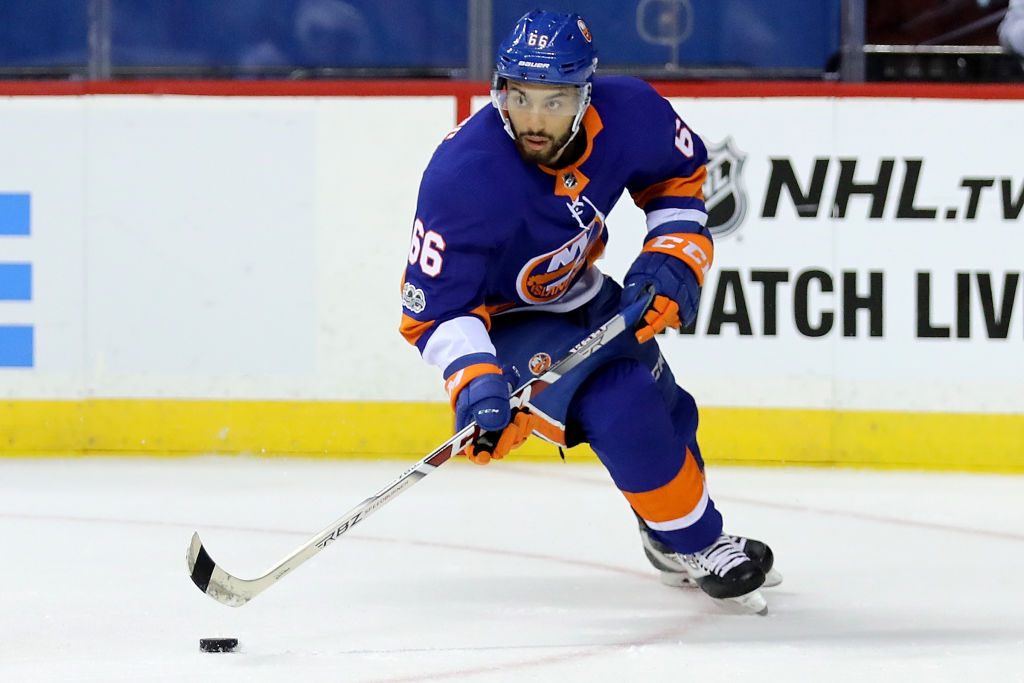 NEW YORK, NY - OCTOBER 07: Joshua Ho-Sang #66 of the New York Islanders passes the puck against the Buffalo Sabres in the first period at Barclays Center on October 7, 2017 in the Brooklyn Borough of New York City. (Photo by Abbie Parr/Getty Images)