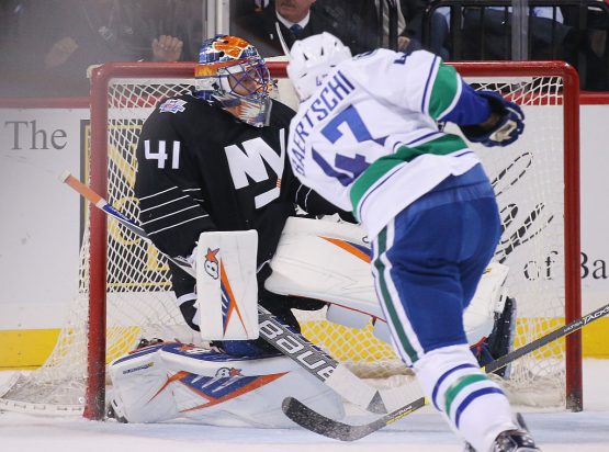 NEW YORK, NY - JANUARY 17: Jaroslav Halak #41 of the New York Islanders makes the second period save on Sven Baertschi #47 of the Vancouver Canucks at the Barclays Center on January 17, 2016 in the Brooklyn borough of New York City. (Photo by Bruce Bennett/Getty Images)