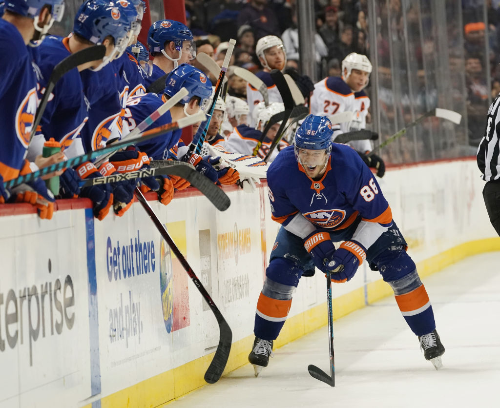 NEW YORK, NY - NOVEMBER 07: Nikolay Kulemin #86 of the New York Islanders is injured on a second period check by Eric Gryba #62 of the Edmonton Oilers at the Barclays Center on November 7, 2017 in the Brooklyn borough of New York City. (Photo by Bruce Bennett/Getty Images)