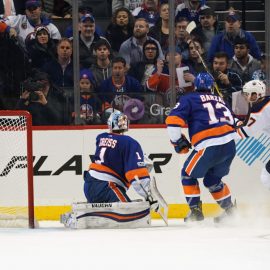 NEW YORK, NY - NOVEMBER 07: Connor McDavid #97 of the Edmonton Oilers celebrates his game winning overtime goal against Thomas Greiss #1 of the New York Islanders at the Barclays Center on November 7, 2017 in the Brooklyn borough of New York City. The Oilers defeated the Islanders 2-1 in overtime. (Photo by Bruce Bennett/Getty Images)