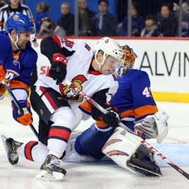 Dec 1, 2017; Brooklyn, NY, USA; Ottawa Senators center Ryan Dzingel (18) scores the game winning goal against New York Islanders goalie Jaroslav Halak (41) in front of Islanders defenseman Dennis Seidenberg (4) during the third period at Barclays Center. Mandatory Credit: Brad Penner-USA TODAY Sports