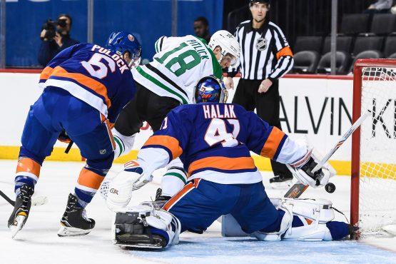 Dec 13, 2017; Brooklyn, NY, USA; Dallas Stars center Tyler Pitlick (18) scored a goal past New York Islanders goalie Jaroslav Halak (41) during the first period at Barclays Center. Mandatory Credit: Dennis Schneidler-USA TODAY Sports