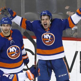 Dec 16, 2017; Brooklyn, NY, USA; New York Islanders center Jordan Eberle (7) and New York Islanders center Mathew Barzal (13) celebrate after defeating the Los Angeles Kings 4-3 in overtime at Barclays Center. Mandatory Credit: Noah K. Murray-USA TODAY Sports