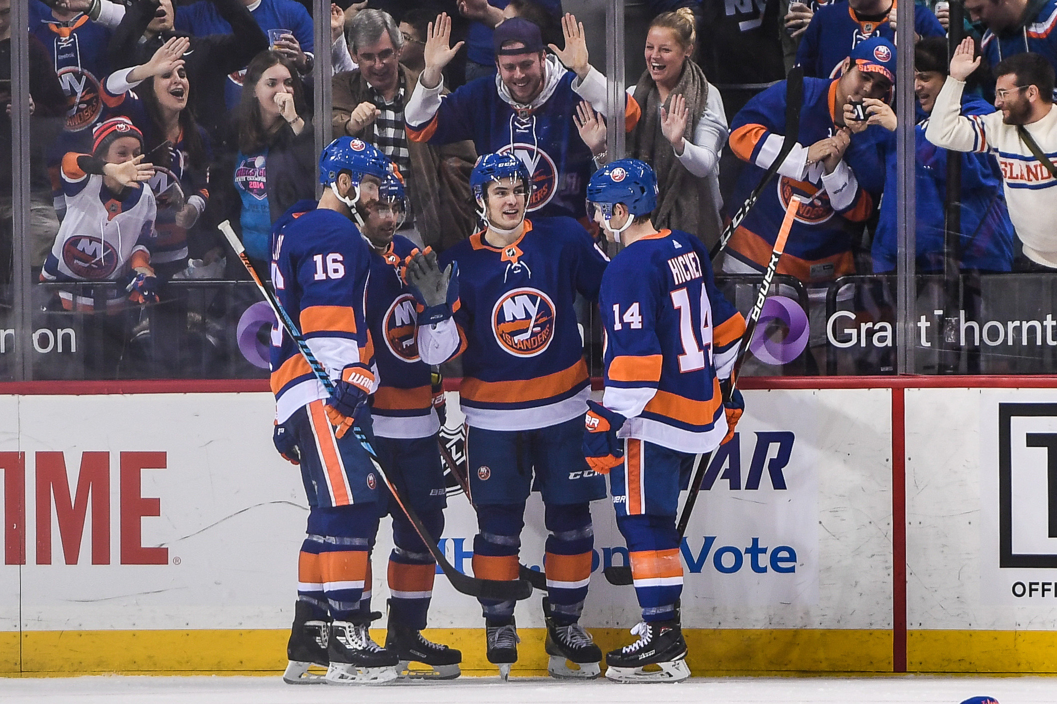 Dec 23, 2017; Brooklyn, NY, USA; New York Islanders center Mathew Barzal (13) celebrates his first hat trick during the third period between the New York Islanders and the Winnipeg Jets at Barclays Center. Mandatory Credit: Dennis Schneidler-USA TODAY Sports
