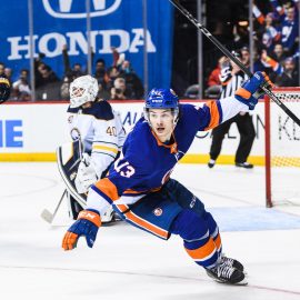 Dec 27, 2017; Brooklyn, NY, USA; New York Islanders center Mathew Barzal (13) celebrates his goal in overtime to win the game 3-2 during the overtime period go the game between the New York Islanders and the Buffalo Sabres at Barclays Center. Mandatory Credit: Dennis Schneidler-USA TODAY Sports