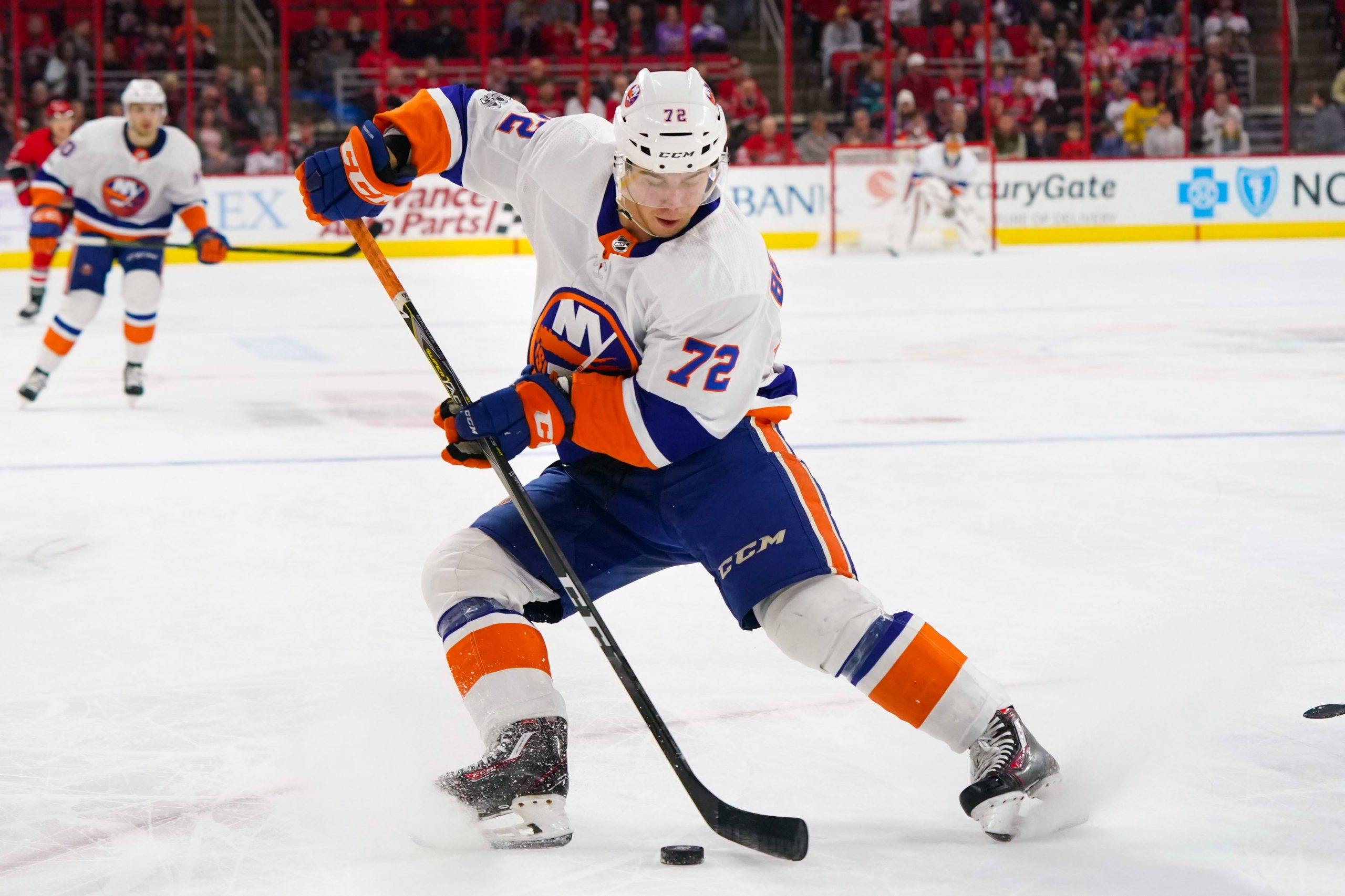 Nov 19, 2017; Raleigh, NC, USA; New York Islanders forward Anthony Beauvillier (72) skates with the puck against the Carolina Hurricanes at PNC Arena. The Carolina Hurricanes defeated the New York Islanders 4-2. Mandatory Credit: James Guillory-USA TODAY Sports
