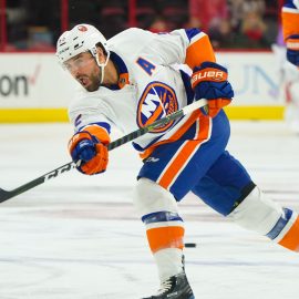 Nov 19, 2017; Raleigh, NC, USA; New York Islanders defensemen Johnny Boychuk (55) takes a slap shot before the game against the Carolina Hurricanes at PNC Arena. The Carolina Hurricanes defeated the New York Islanders 4-2. Mandatory Credit: James Guillory-USA TODAY Sports