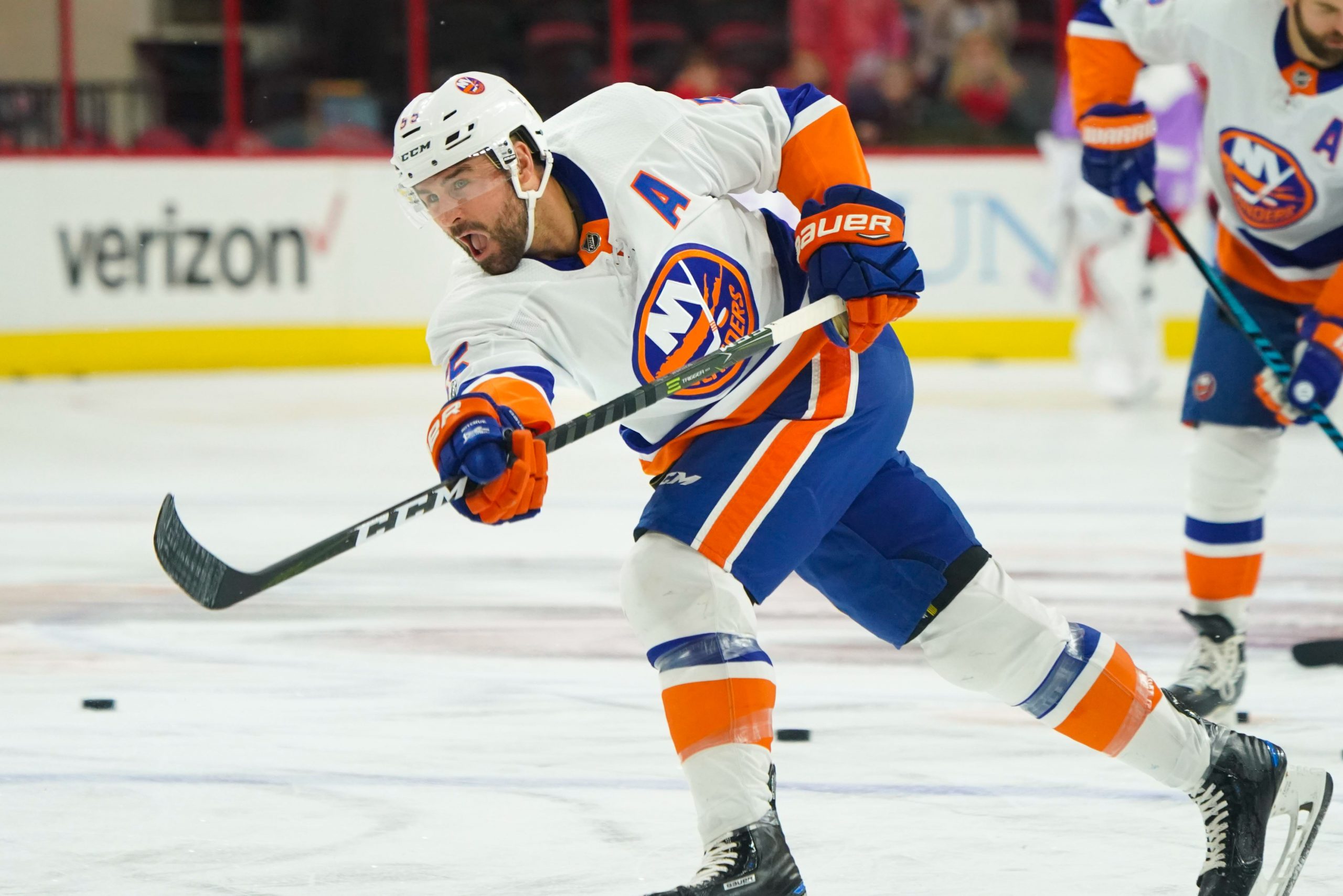 Nov 19, 2017; Raleigh, NC, USA; New York Islanders defensemen Johnny Boychuk (55) takes a slap shot before the game against the Carolina Hurricanes at PNC Arena. The Carolina Hurricanes defeated the New York Islanders 4-2. Mandatory Credit: James Guillory-USA TODAY Sports