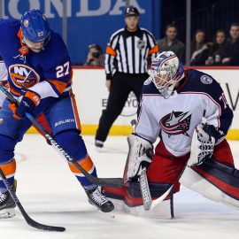 Feb 3, 2018; Brooklyn, NY, USA; Columbus Blue Jackets goalie Joonas Korpisalo (70) makes a save against New York Islanders center Anders Lee (27) during the second period at Barclays Center. Mandatory Credit: Brad Penner-USA TODAY Sports