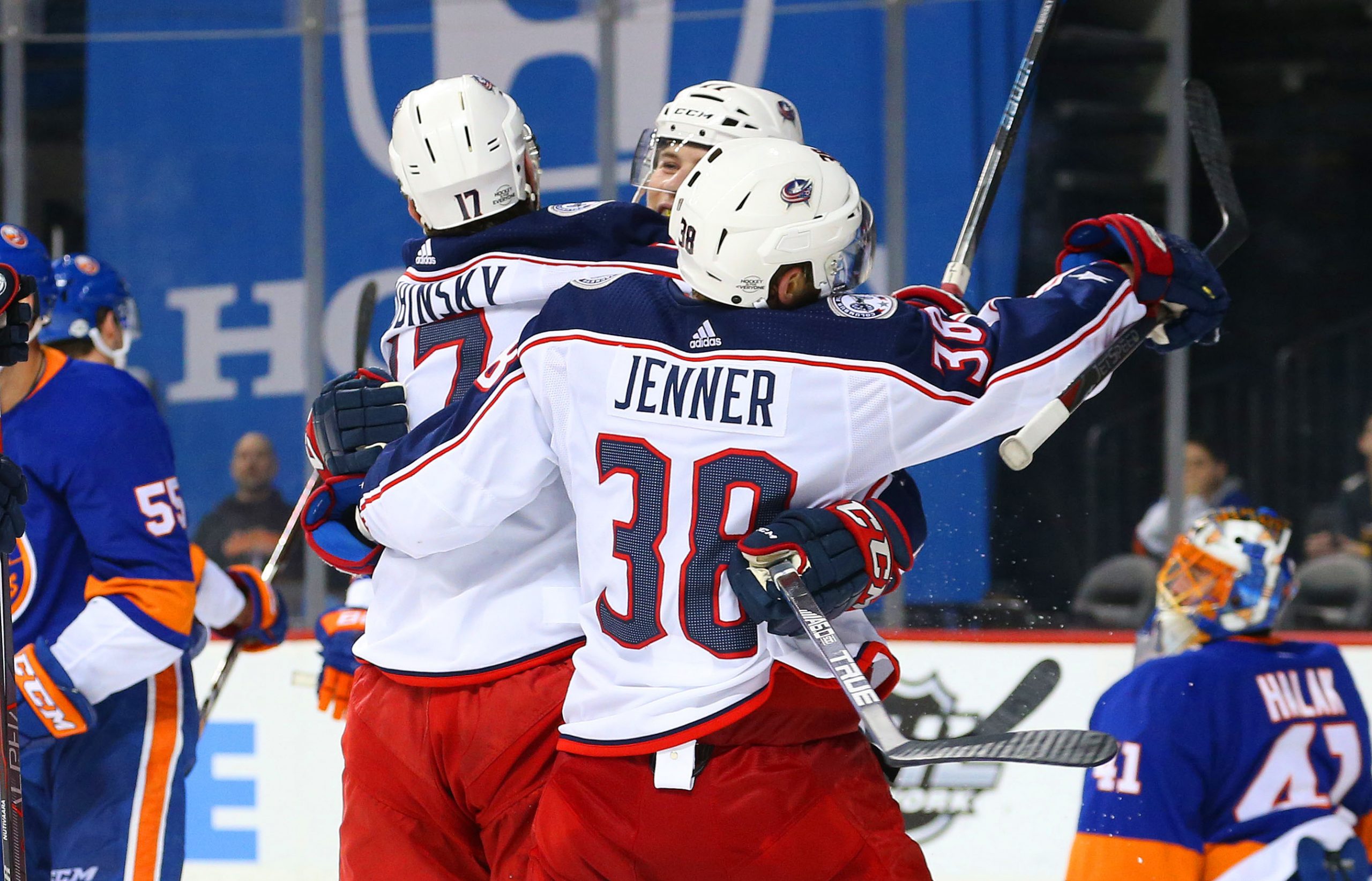 Feb 13, 2018; Brooklyn, NY, USA; Columbus Blue Jackets center Brandon Dubinsky (17) is congratulated by his teammates after scoring a goal against the New York Islanders during the third period at Barclays Center. Mandatory Credit: Andy Marlin-USA TODAY Sports
