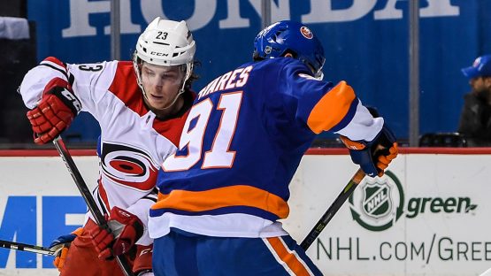 Mar 18, 2018; Brooklyn, NY, USA;New York Islanders goaltender Jaroslav Halak (41) makes a save on Carolina Hurricanes left wing Brock McGinn (23) during the first period at Barclays Center. Mandatory Credit: Dennis Schneidler-USA TODAY Sports