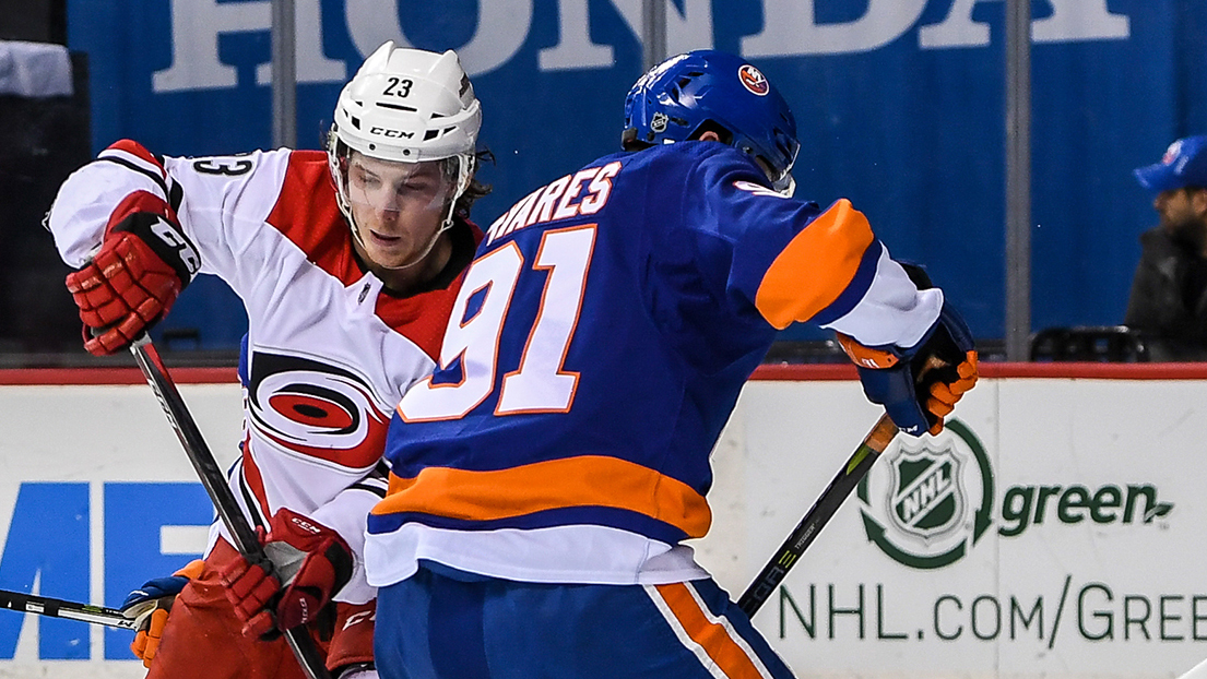 Mar 18, 2018; Brooklyn, NY, USA;New York Islanders goaltender Jaroslav Halak (41) makes a save on Carolina Hurricanes left wing Brock McGinn (23) during the first period at Barclays Center. Mandatory Credit: Dennis Schneidler-USA TODAY Sports