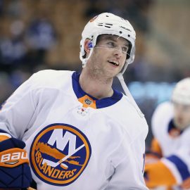 Feb 22, 2018; Toronto, Ontario, CAN; New York Islanders defenseman Thomas Hickey (14) warms up before playing against the Toronto Maple Leafs at Air Canada Centre. Mandatory Credit: Tom Szczerbowski-USA TODAY Sports