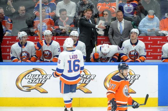 Mar 8, 2018; Edmonton, Alberta, CAN; New York Islanders Head Coach Doug Weight is seen on the players bench as they played the Edmonton Oilers during the third period at Rogers Place. Oilers won in a shootout 2-1. Mandatory Credit: Walter Tychnowicz-USA TODAY Sports