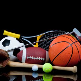 Assorted Sports Equipment on Black