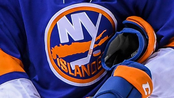 Feb 5, 2018; Brooklyn, NY, USA; New York Islanders center Mathew Barzal (13) stands for the Nation Anthem before the game against the Nashville Predators at Barclays Center. Mandatory Credit: Dennis Schneidler-USA TODAY Sports