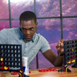 rajon-rondo-playing-a-game-of-connect-four.0.0