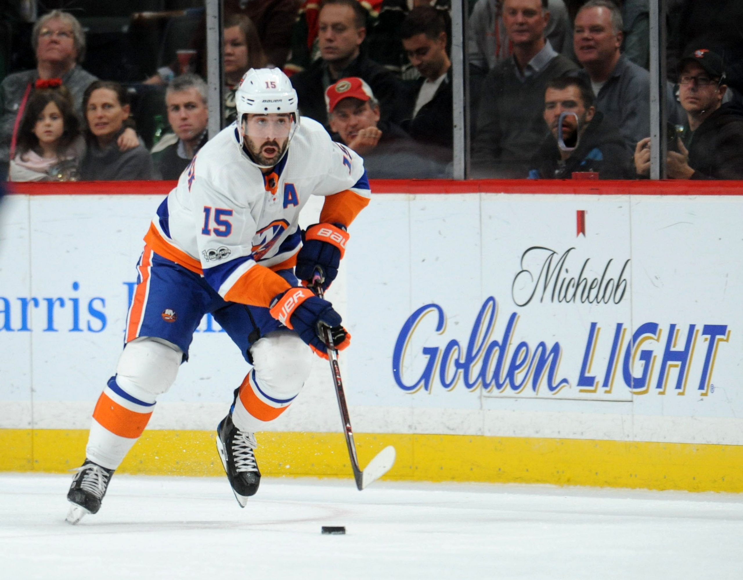 Oct 26, 2017; Saint Paul, MN, USA; New York Islanders forward Cal Clutterbuck (15) carries the puck up ice during the second period against the Minnesota Wild at Xcel Energy Center. Mandatory Credit: Marilyn Indahl-USA TODAY Sports
