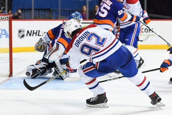 Nov 5, 2018; Brooklyn, NY, USA; Montreal Canadiens center Jonathan Drouin (92) attempts a shot on New York Islanders goaltender Thomas Greiss (1) during the third period at Barclays Center. Mandatory Credit: Dennis Schneidler-USA TODAY Sports