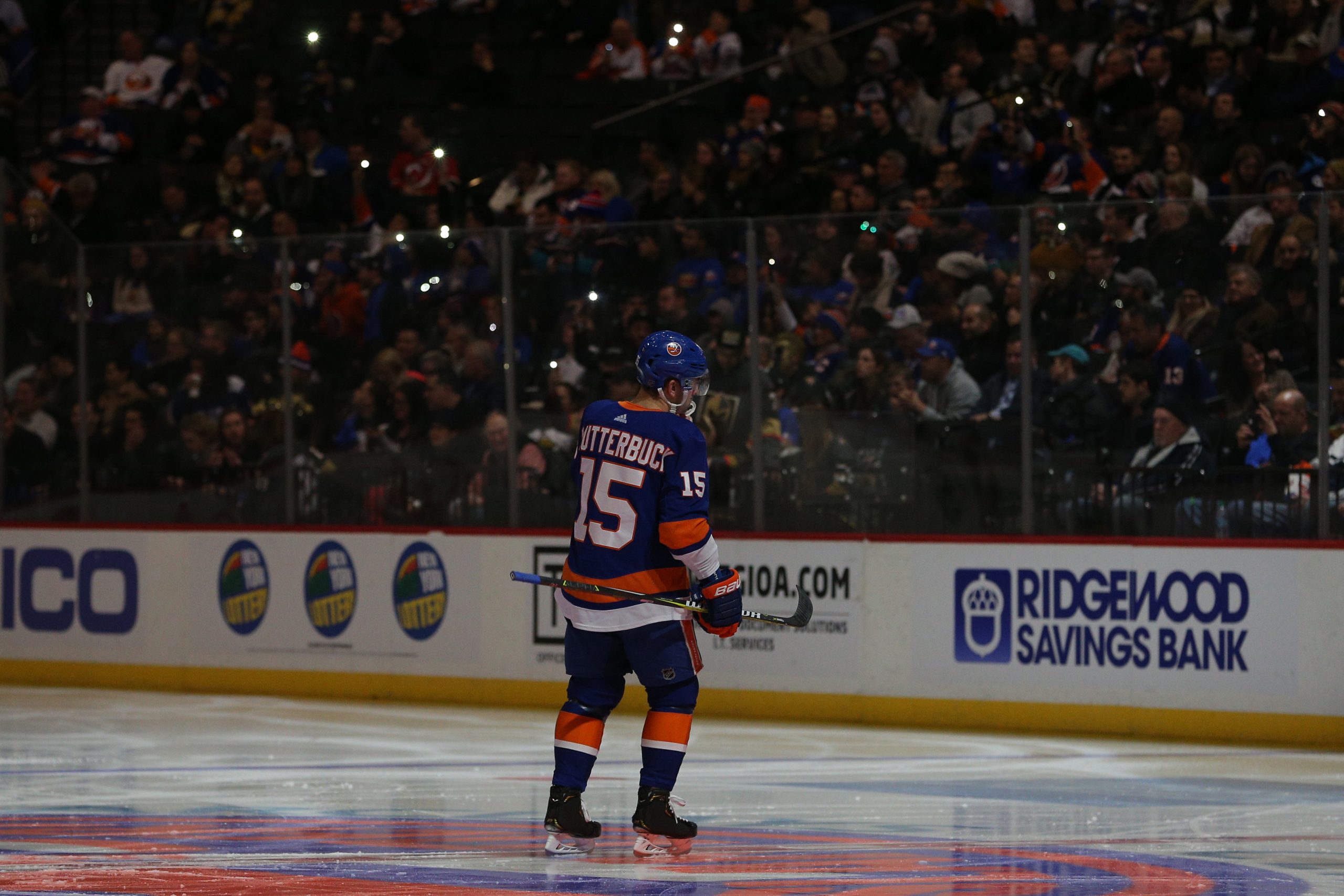 Dec 12, 2018; Brooklyn, NY, USA; Fans hold up cellphone lights from the stands during a lighting delay before the start of the third period between the New York Islanders and the Vegas Golden Knights at Barclays Center. Mandatory Credit: Brad Penner-USA TODAY Sports