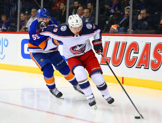 Feb 13, 2018; Brooklyn, NY, USA; Columbus Blue Jackets left wing Artemi Panarin (9) and New York Islanders defenseman Johnny Boychuk (55) pursue a loose puck during the third period at Barclays Center. Mandatory Credit: Andy Marlin-USA TODAY Sports