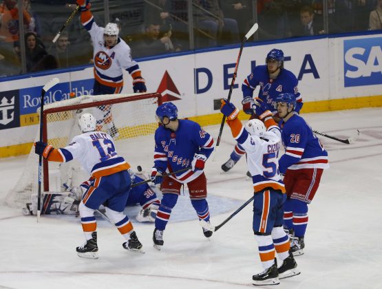 Jan 10, 2019; New York, NY, USA; New York Islanders right wing Josh Bailey (12) scores a goal the game winning goal against New York Rangers goaltender Henrik Lundqvist (30) during the third period at Madison Square Garden. The New York Islanders won 4-3.