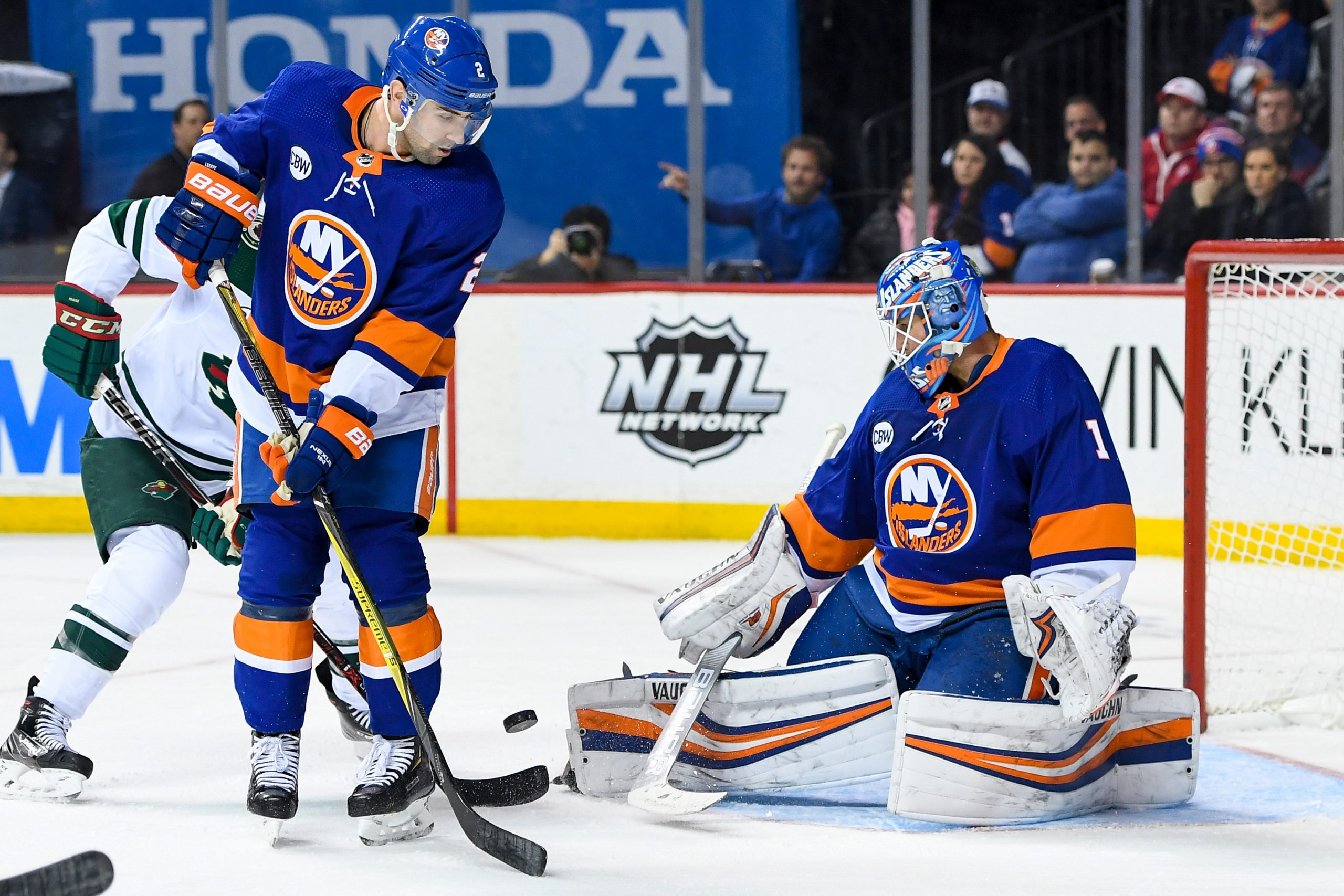 Feb 10, 2019; Brooklyn, NY, USA; New York Islanders goaltender Thomas Greiss (1) makes a save against the ]Minnesota Wild during the third period at Barclays Center. Mandatory Credit: Dennis Schneidler-USA TODAY Sports