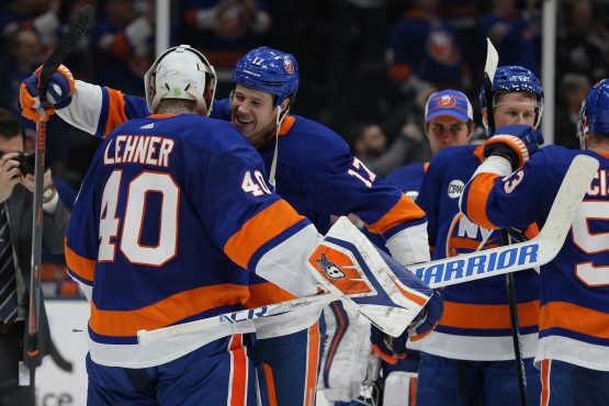 Feb 28, 2019; Brooklyn, NY, USA; New York Islanders left wing Matt Martin (17) celebrates with New York Islanders goalie Robin Lehner (40) after defeating the Toronto Maple Leafs at the Nassau Veterans Memorial Coliseum. Mandatory Credit: Brad Penner-USA TODAY Sports