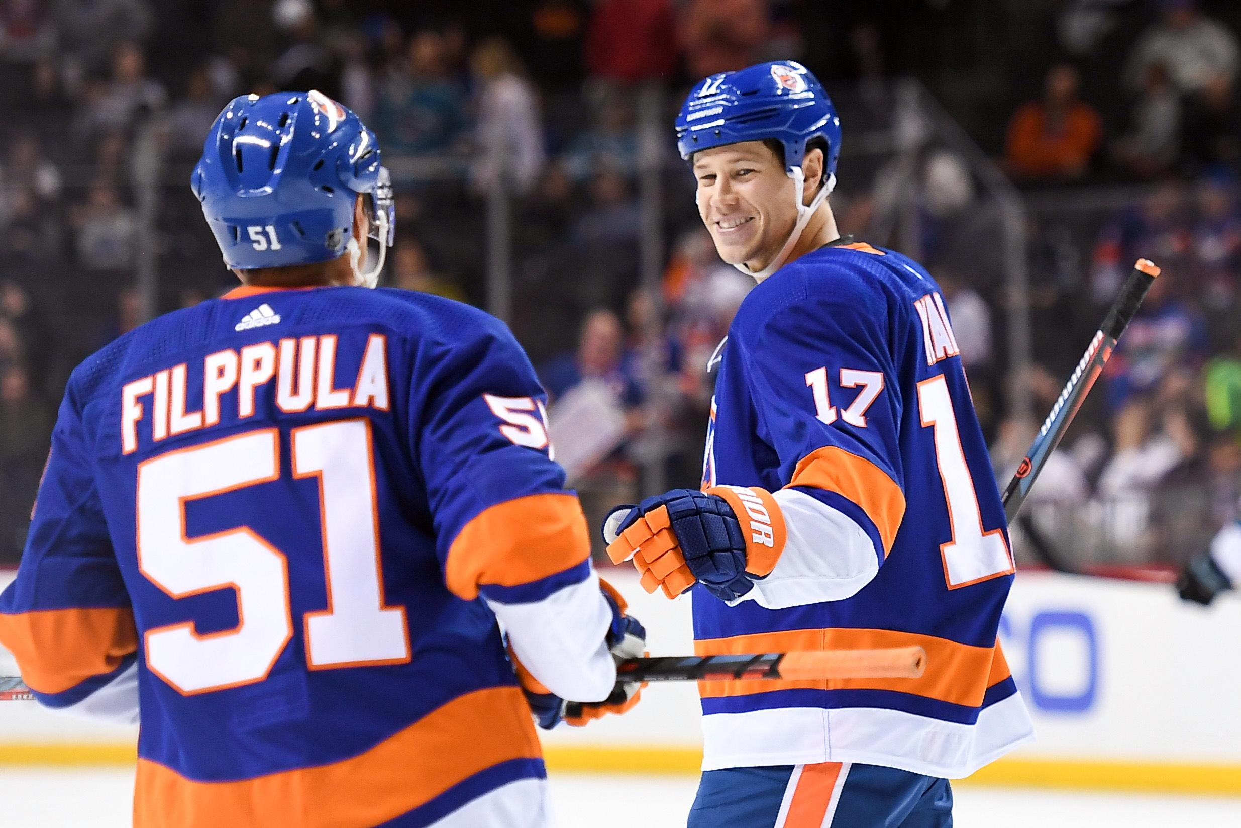 Oct 8, 2018; Brooklyn, NY, USA; New York Islanders left wing Matt Martin (17) celebrates his goal with New York Islanders center Valtteri Filppula (51) against the San Jose Sharks during the third period at Barclays Center. Mandatory Credit: Dennis Schneidler-USA TODAY Sports