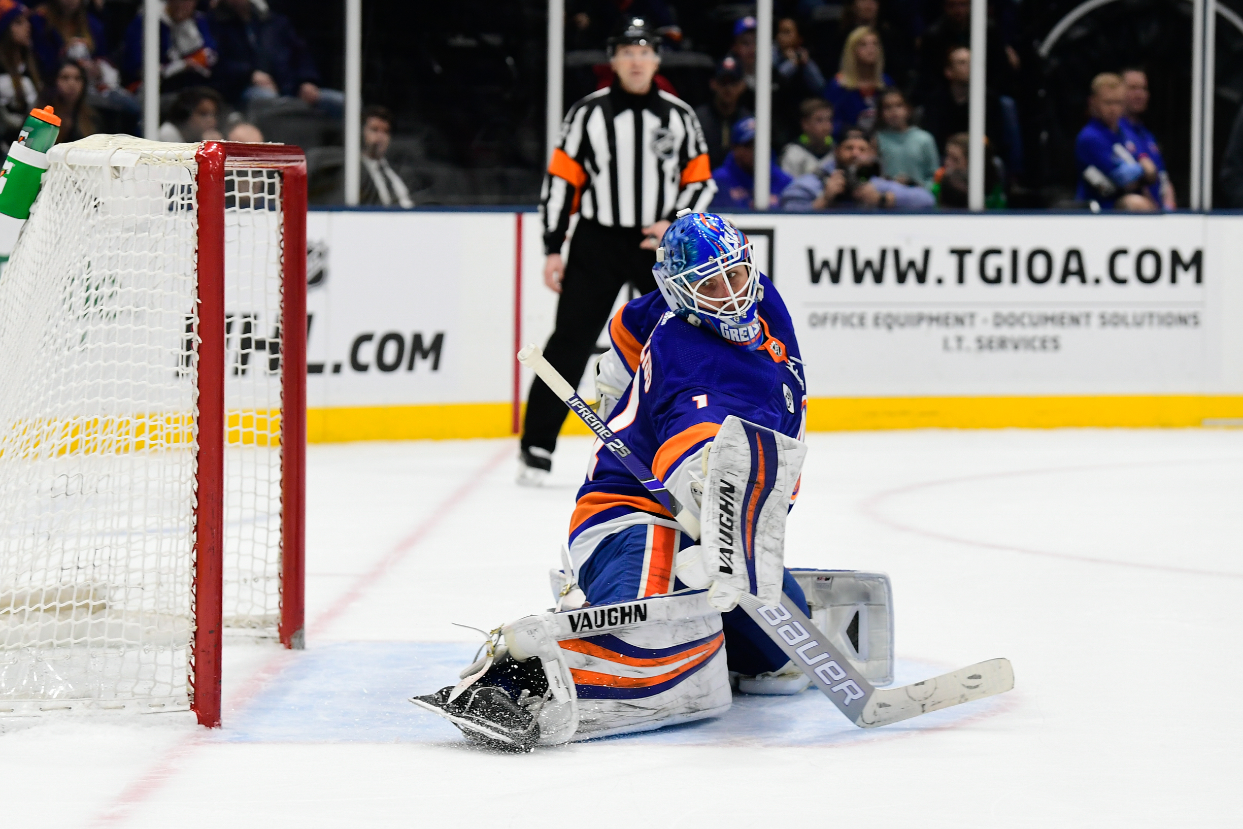 Mar 11, 2019; Uniondale, NY, USA; New York Islanders goalie Thomas Greiss (1) deflects a puck against the Columbus Blue Jackets during the third period at Nassau Veterans Memorial Coliseum. Mandatory Credit: Catalina Fragoso-USA TODAY Sports