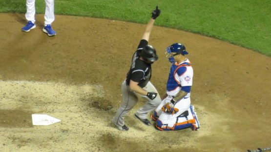 Daniel Murphy crosses plate