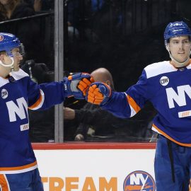 Feb 16, 2019; Brooklyn, NY, USA; New York Islanders defenseman Ryan Pulock (6) celebrates his goal against the Edmonton Oilers with defenseman Devon Toews (25) and left wing Anthony Beauvillier (18) during the second period at Barclays Center. Mandatory Credit: Brad Penner-USA TODAY Sports