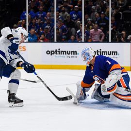 Nov 1, 2019; Uniondale, NY, USA; New York Islanders goaltender Thomas Greiss (1) makes a save on Tampa Bay Lightning left wing Ondrej Palat (18) during the first period at Nassau Veterans Memorial Coliseum. Mandatory Credit: Dennis Schneidler-USA TODAY Sports