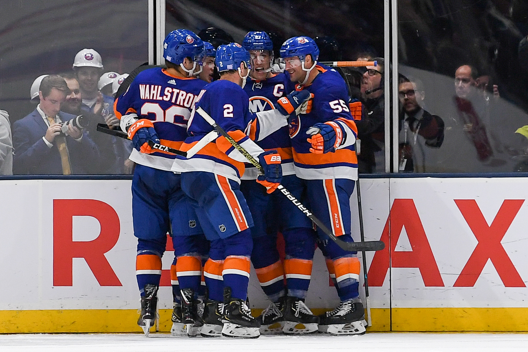 Nov 1, 2019; Uniondale, NY, USA; New York Islanders celebrate the goal by New York Islanders center Anders Lee (27) against the Tampa Bay Lightning during the third period at Nassau Veterans Memorial Coliseum. Mandatory Credit: Dennis Schneidler-USA TODAY Sports