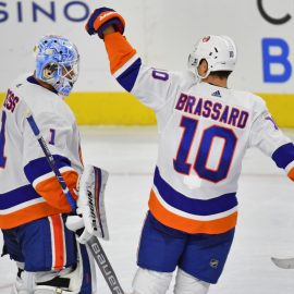 Nov 16, 2019; Philadelphia, PA, USA; New York Islanders goaltender Thomas Greiss (1) and center Derick Brassard (10) celebrate a win against the Philadelphia Flyers during the shootout period at Wells Fargo Center. Mandatory Credit: Eric Hartline-USA TODAY Sports