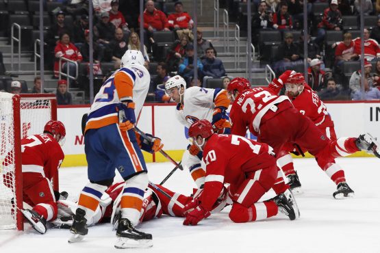 Dec 2, 2019; Detroit, MI, USA; New York Islanders center Jordan Eberle (7) scores a goal on Detroit Red Wings goaltender Jonathan Bernier (45) in the third period at Little Caesars Arena. Mandatory Credit: Rick Osentoski-USA TODAY Sports